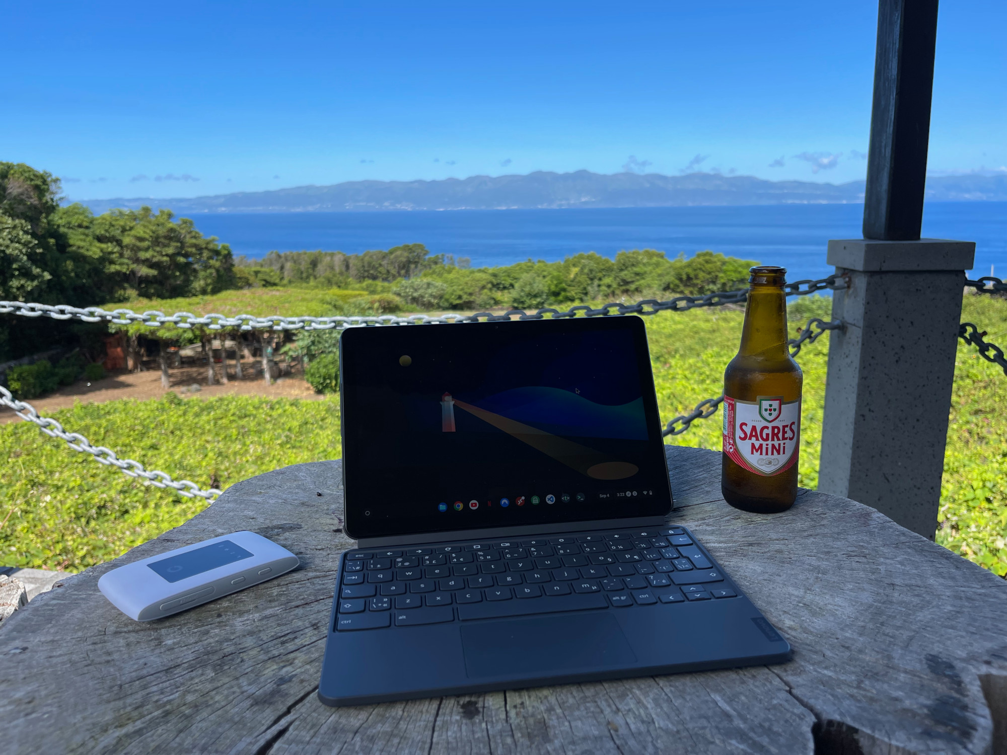 Lenovo Chromebook Duet 2-in-1, with a Vodafone LTE hotspot and a beverage